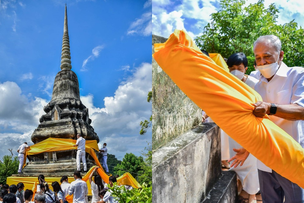 พุทธศาสนิกชนแห่ผ้าขึ้นพระธาตุเจดีย์อายุกว่า 360 ปี วัดเขาเมืองเก่าชัยบุรี