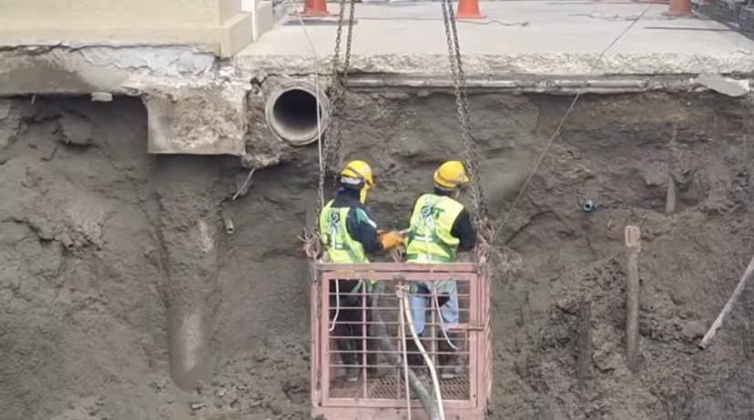 เทคนิค "Shotcrete" เสริมผนังดินใต้อาคาร สน.สามเสน ป้องกันทรุดซ้ำ ก่อนถมทรายปิดหลุมยุบ