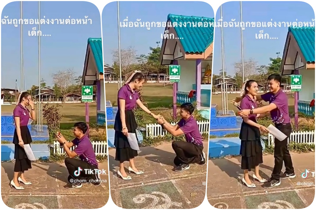 พยานรักเพียบ! ครูสาวถูกแฟนหนุ่ม ‘คุกเข่าขอแต่งงาน’ หน้าเสาธง เสียงเชียร์กระหึ่ม!