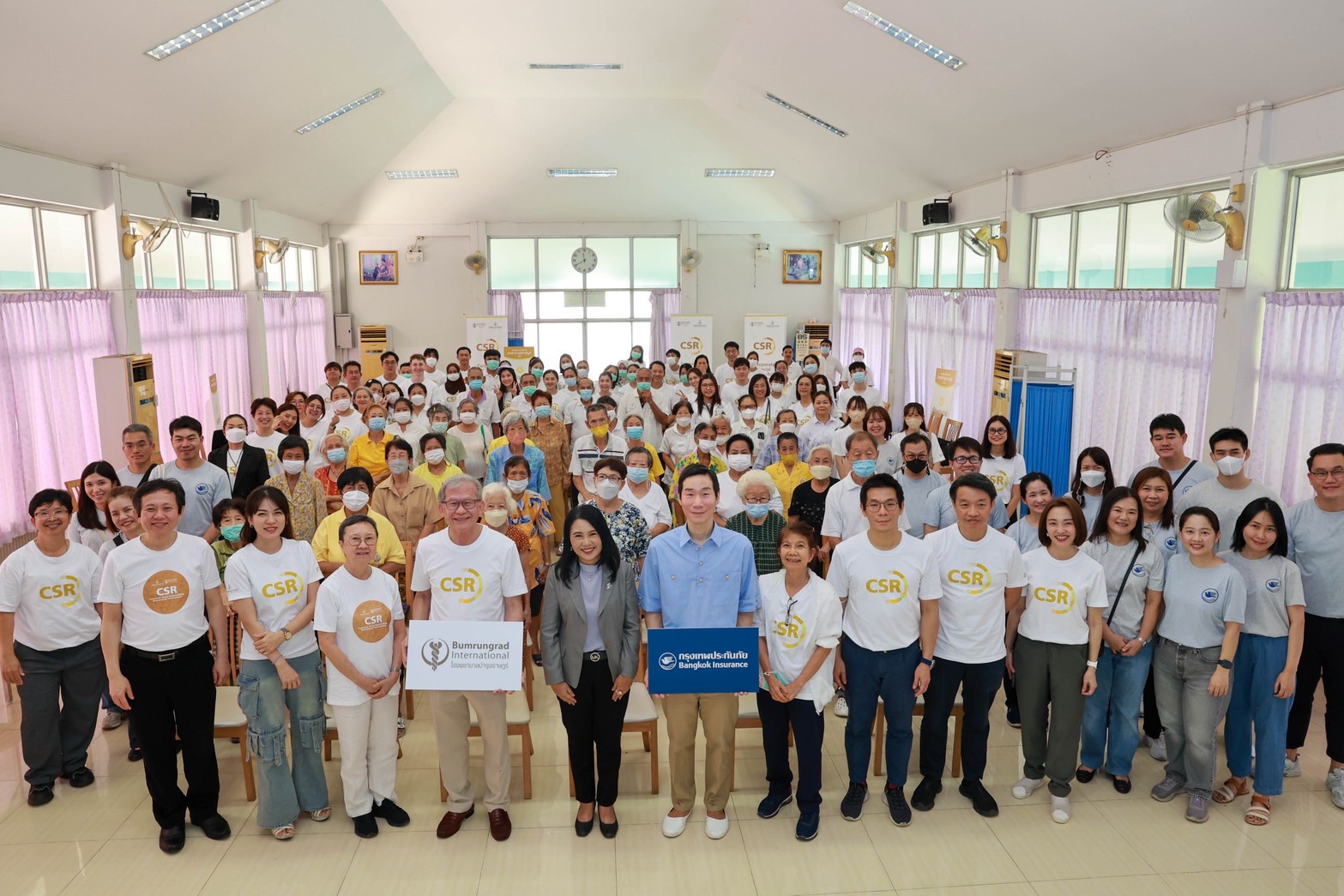 กรุงเทพประกันภัยจับมือรพ.บำรุงราษฎร์ร่วมจัดกิจกรรม BKI อาสาพัฒนาบ้านพักคนชราพร้อมกับอาสาบำรุงราษฎร์ออกหน่วยแพทย์เคลื่อนที่ตรวจสุขภาพผู้สูงอายุบ้านบางแค