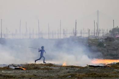 การเผาพื้นที่ทางการเกษตร ซึ่งก่อปัญหามลภาวะทางอากาศ (Photo : AFP)